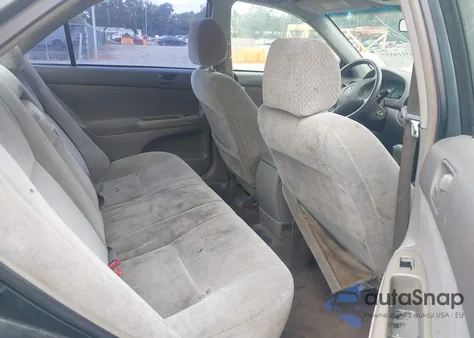 2002 Toyota Camry Le z USA, uszkodzony, nr VIN 4T1BE32K22U599422